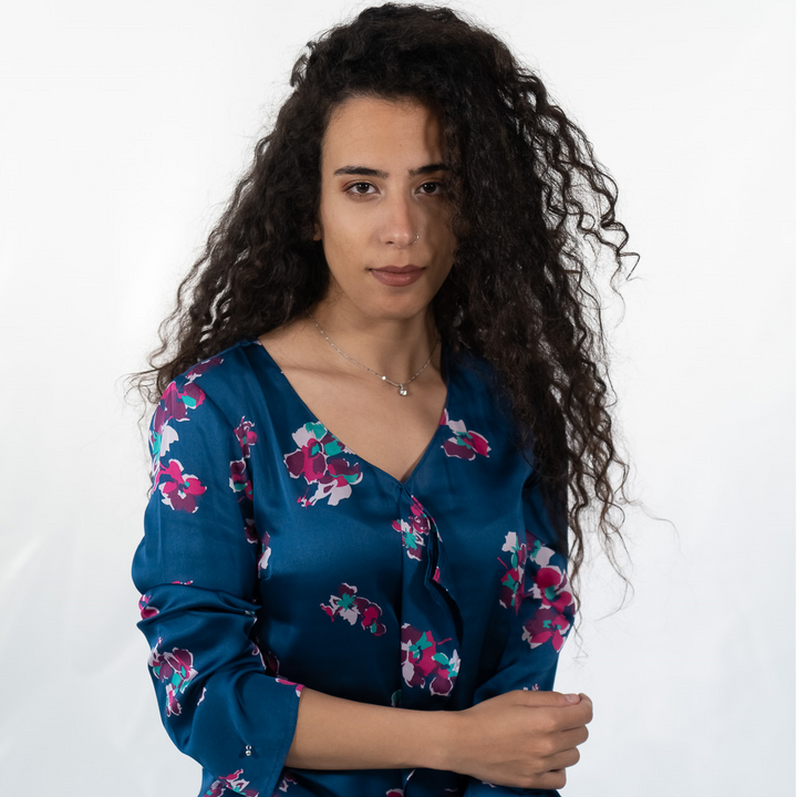Blouse decorated with floral print