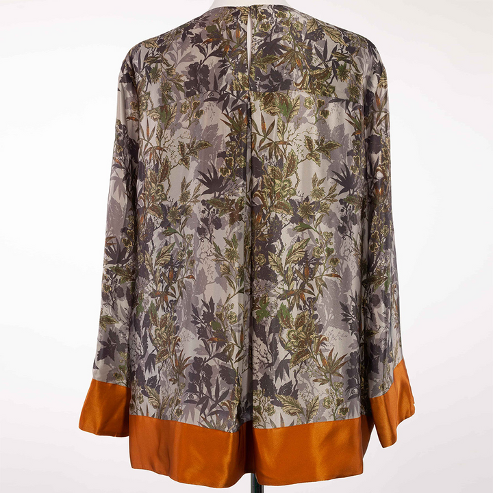 Blouse decorated with floral print