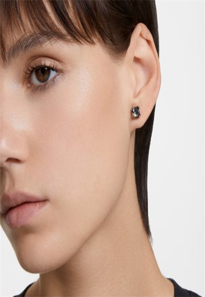 Earring adorned with black crystal