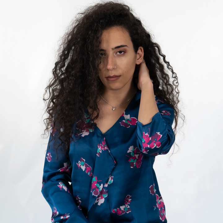 Blouse decorated with floral print