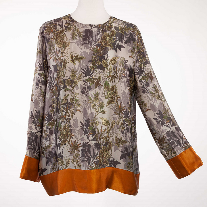 Blouse decorated with floral print